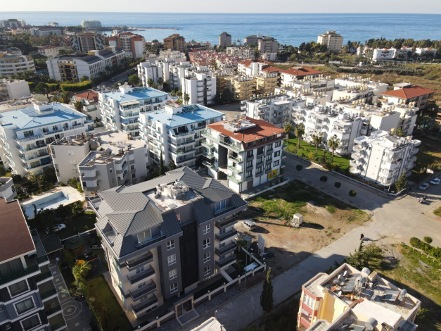 Двухкомнатная квартира в новой резиденции рядом с пляжем в районе Авсаллар, 55 м2 - Ракурс 6