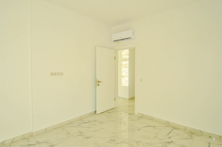 Двухкомнатная квартира в новой резиденции рядом с пляжем в районе Авсаллар, 55 м2 - Ракурс 9