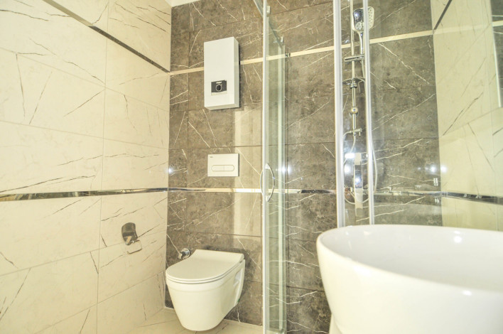 Двухкомнатная квартира в новой резиденции рядом с пляжем в районе Авсаллар, 55 м2 - Ракурс 11