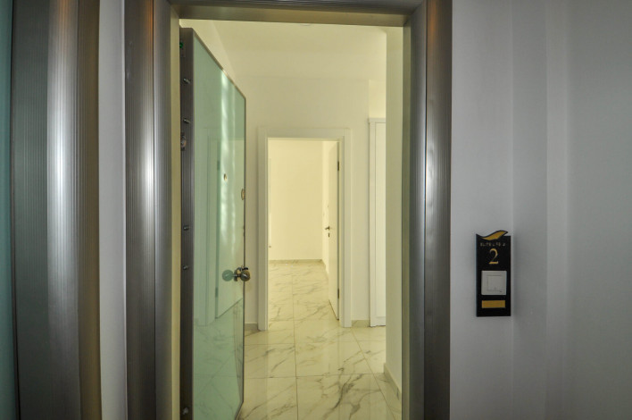 Двухкомнатная квартира в новой резиденции рядом с пляжем в районе Авсаллар, 55 м2 - Ракурс 13