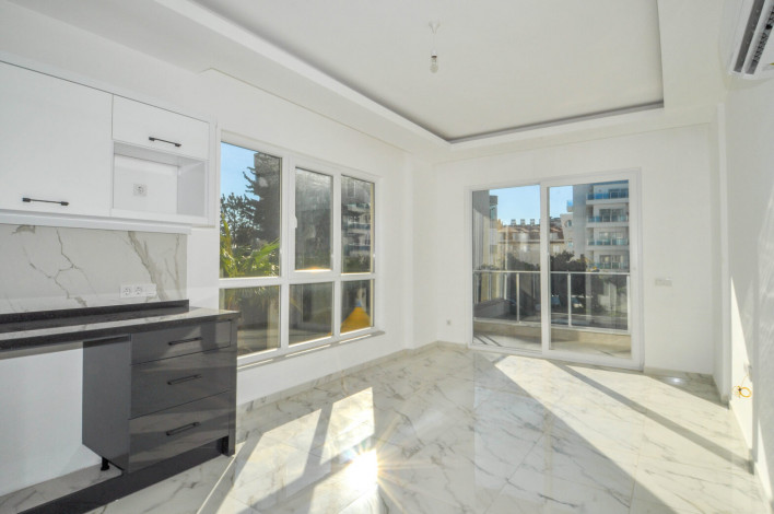 Двухкомнатная квартира в новой резиденции рядом с пляжем в районе Авсаллар, 55 м2 - Ракурс 14