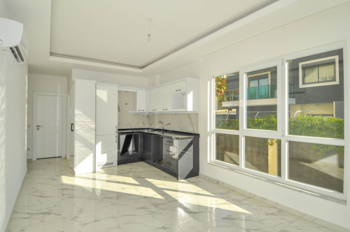 Двухкомнатная квартира в новой резиденции рядом с пляжем в районе Авсаллар, 55 м2 - Ракурс 15