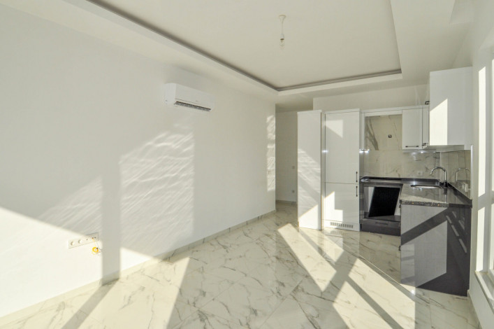 Двухкомнатная квартира в новой резиденции рядом с пляжем в районе Авсаллар, 55 м2 - Ракурс 16