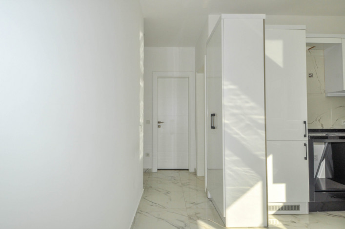 Двухкомнатная квартира в новой резиденции рядом с пляжем в районе Авсаллар, 55 м2 - Ракурс 17