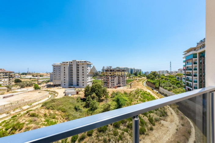 Трехкомнатная квартира с люксовой мебелью в новом комплексе в Авсалларе, 105 м2 - Ракурс 2