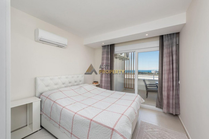 Полностью меблированная двухкомнатная квартира на высоком этаже с видом на море в Авсаллар, 65 м2 - Ракурс 3