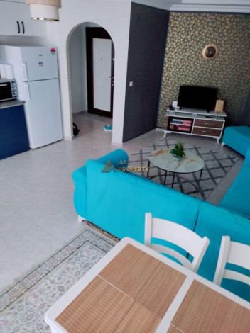 Меблированная двухкомнатная квартира с крытым бассейном в Махмутларе, 60 м2 - Ракурс 2