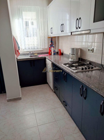 Меблированная двухкомнатная квартира с крытым бассейном в Махмутларе, 60 м2 - Ракурс 5