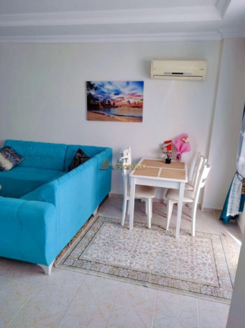 Меблированная двухкомнатная квартира с крытым бассейном в Махмутларе, 60 м2 - Ракурс 9