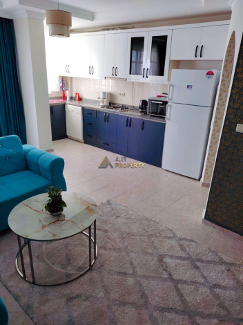 Меблированная двухкомнатная квартира с крытым бассейном в Махмутларе, 60 м2 - Ракурс 10