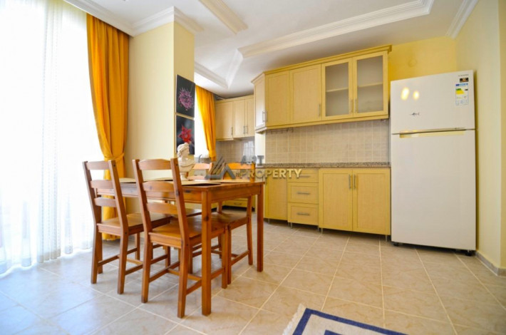 Квартира 1+1 в комплексе с крытым бассейном рядом с улицей Ататюрка в Махмутларе, 65 м2 - Ракурс 28