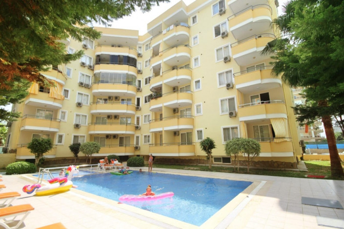 Квартира 1+1 в комплексе с крытым бассейном рядом с улицей Ататюрка в Махмутларе, 65 м2 - Ракурс 47