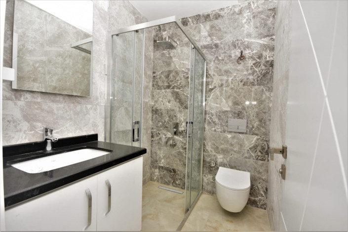 Трехкомнатные апартаменты с мебелью в районе пляжа Клеопатры города Аланья, 95 м2 - Ракурс 11