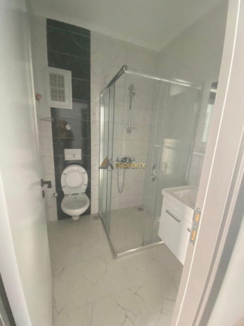 Двухкомнатная квартира в комплексе с крытым бассейном в Махмутларе, 47 м2 - Ракурс 15