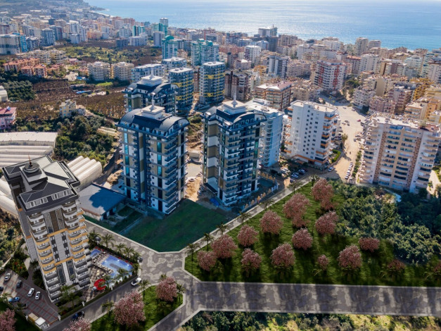 Новый проект с хорошей инфраструктурой в Махмутларе, 48-100 м2 - Ракурс 16