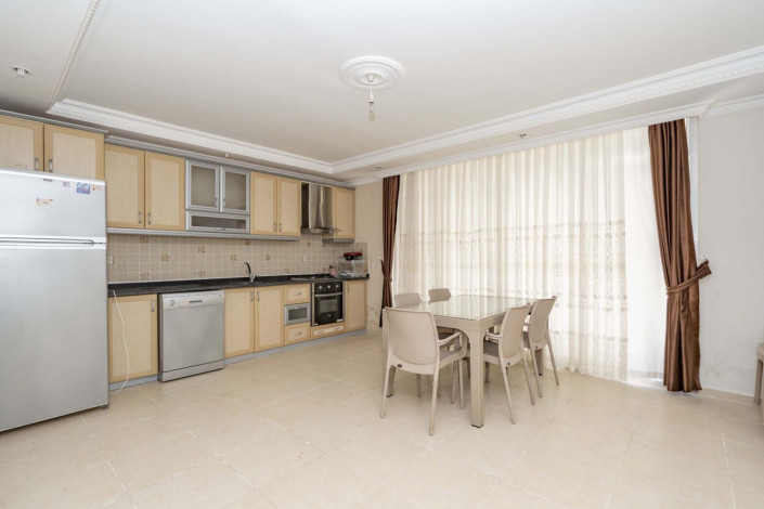 Меблированная двухэтажная вилла 3+1 недалеко от моря в районе Демирташ, 240 м2 - Ракурс 13