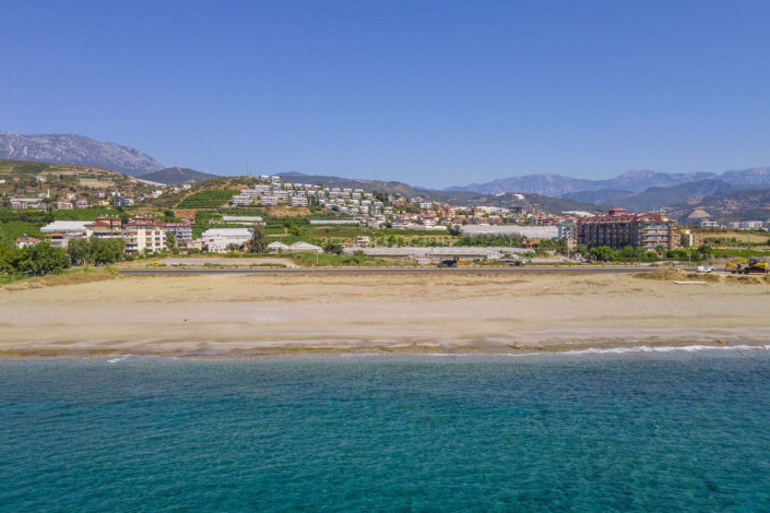 Меблированная двухэтажная вилла 3+1 недалеко от моря в районе Демирташ, 240 м2 - Ракурс 26