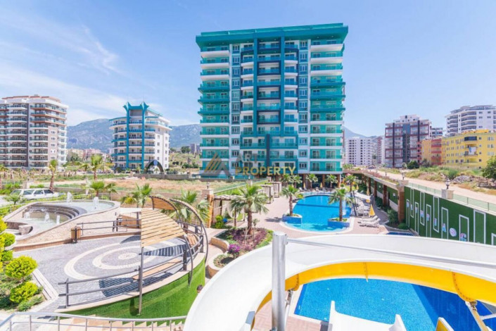 Меблированная квартира 1+1 на высоком этаже с видом на море в Махмутларе, 70 м2 - Ракурс 2