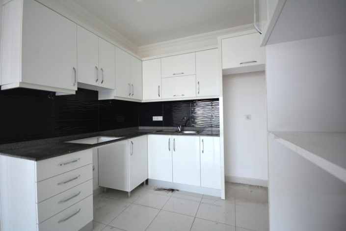 Двухкомнатная квартира в 150 метрах от моря в районе Махмутлар, 75 м2 - Ракурс 30