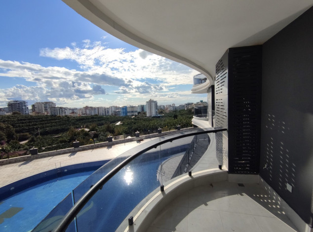 Квартира 1+1 в новом элитном комплексе в районе Махмутлар, 65 м2 - Ракурс 17