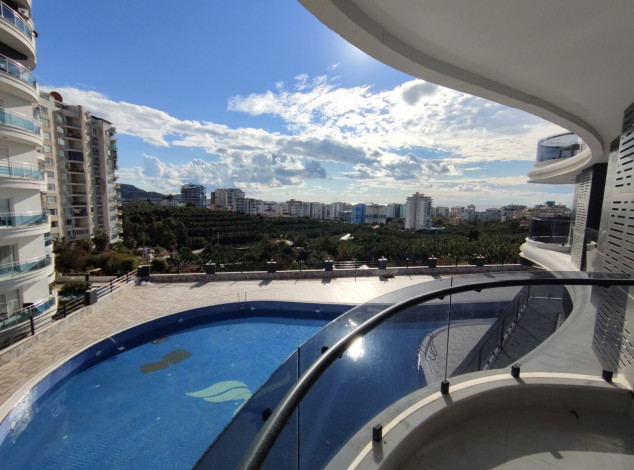 Квартира 1+1 в новом элитном комплексе в районе Махмутлар, 65 м2 - Ракурс 18