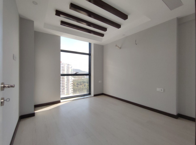 Квартира 1+1 в новом элитном комплексе в районе Махмутлар, 65 м2 - Ракурс 19