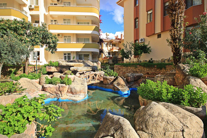 Полностью меблированная трехкомнатная квартира в районе Махмутлар, 130м - Ракурс 40