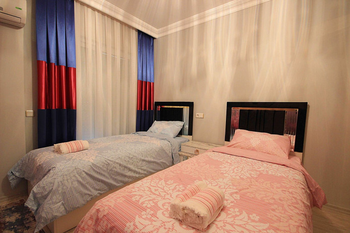 Трехкомнатная квартира с отличным ремонтом и мебелью в 100 метрах от моря в Махмутларе, площадью 120м2 - Ракурс 24