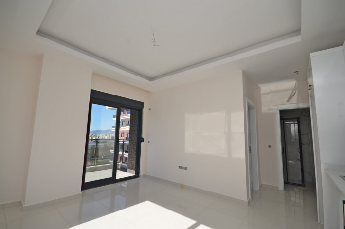 Двухкомнатные апартаменты в новом комплексе в районе Каргыджак, 53 м2 - Ракурс 2