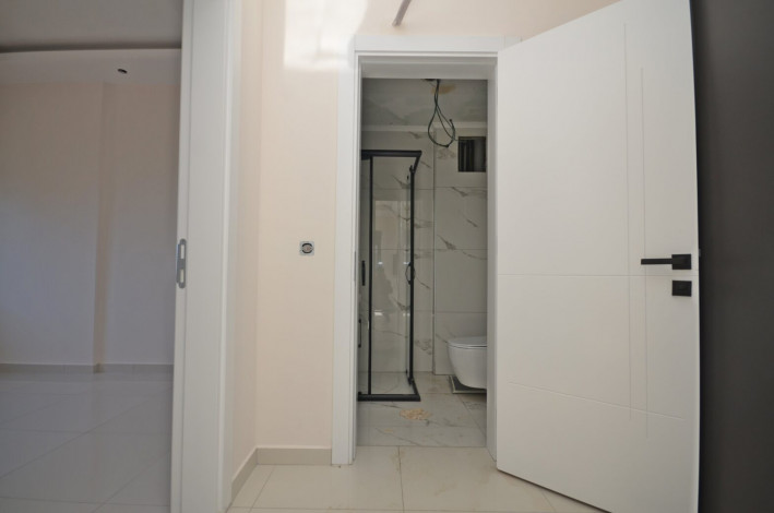 Двухкомнатные апартаменты в новом комплексе в районе Каргыджак, 53 м2 - Ракурс 3