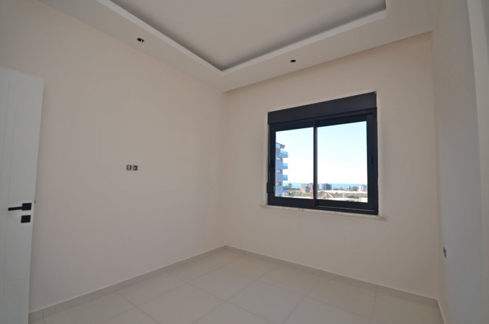 Двухкомнатные апартаменты в новом комплексе в районе Каргыджак, 53 м2 - Ракурс 4