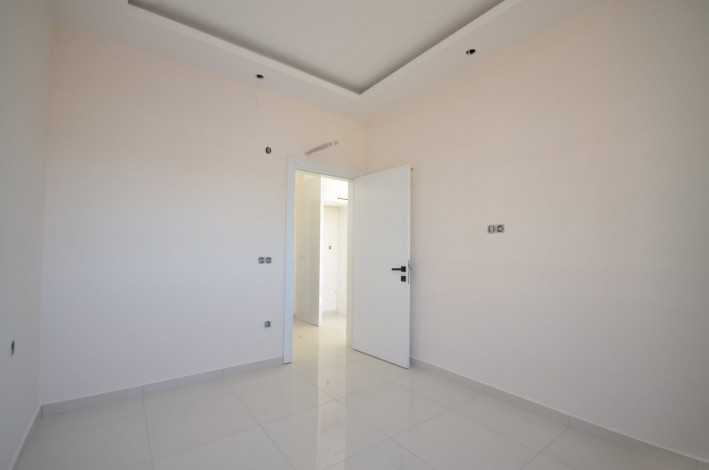 Двухкомнатные апартаменты в новом комплексе в районе Каргыджак, 53 м2 - Ракурс 6