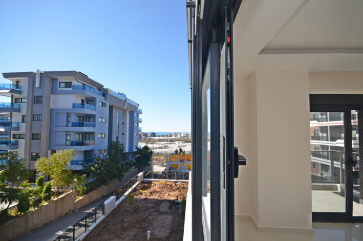 Двухкомнатные апартаменты в новом комплексе в районе Каргыджак, 53 м2 - Ракурс 8