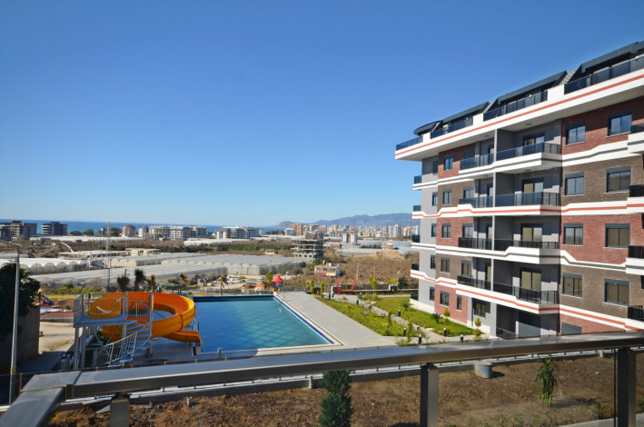 Двухкомнатные апартаменты в новом комплексе в районе Каргыджак, 53 м2 - Ракурс 23