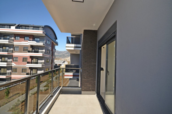 Двухкомнатные апартаменты в новом комплексе в районе Каргыджак, 53 м2 - Ракурс 25