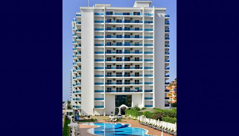 Квартира большой площади с видом на море планировки 1+1 в Махмутларе в комплексе на первой линии моря, 93 м2 - Ракурс 8