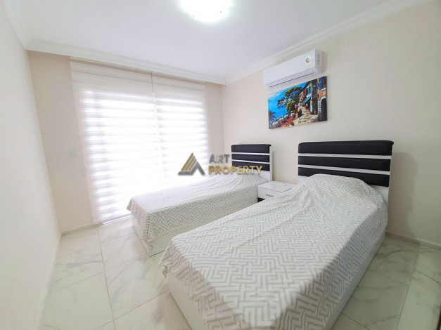 Трехкомнатная квартира с дизайнерским ремонтом и мебелью. 450 метров от моря в Махмутлар, 110м2 - Ракурс 7