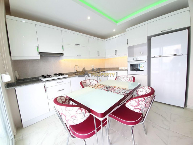 Трехкомнатная квартира с дизайнерским ремонтом и мебелью. 450 метров от моря в Махмутлар, 110м2 - Ракурс 20