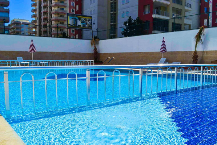 Трехкомнатная квартира с дизайнерским ремонтом и мебелью. 450 метров от моря в Махмутлар, 110м2 - Ракурс 27