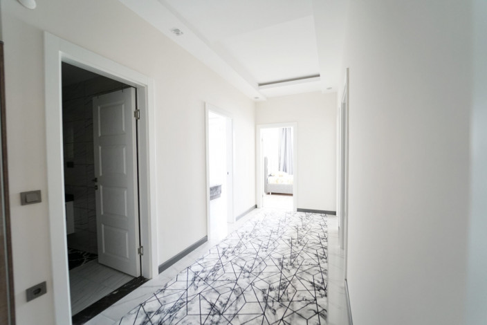 ID 1390  Апартаменты 3+1 в 600 м от моря в районе Махмутлар, 160 м2 - Ракурс 6