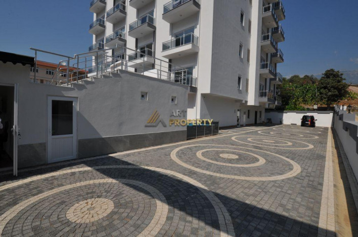 ID 1392  Квартира 1+1 в 500 метрах от моря, в районе Махмутлар,55 м2. - Ракурс 2