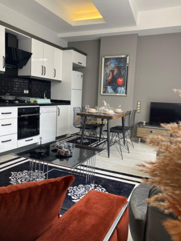 ID 1392  Квартира 1+1 в 500 метрах от моря, в районе Махмутлар,55 м2. - Ракурс 4