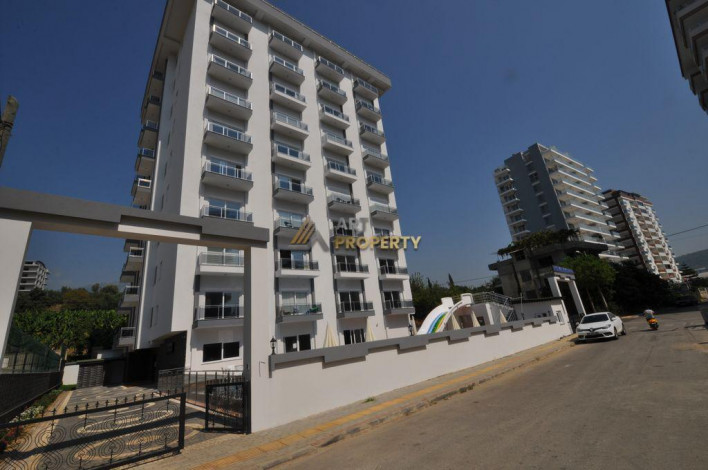 ID 1392  Квартира 1+1 в 500 метрах от моря, в районе Махмутлар,55 м2. - Ракурс 16