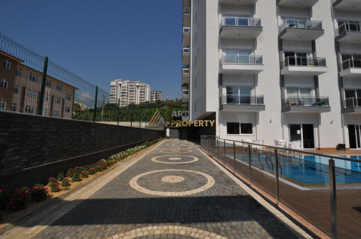 ID 1392  Квартира 1+1 в 500 метрах от моря, в районе Махмутлар,55 м2. - Ракурс 20