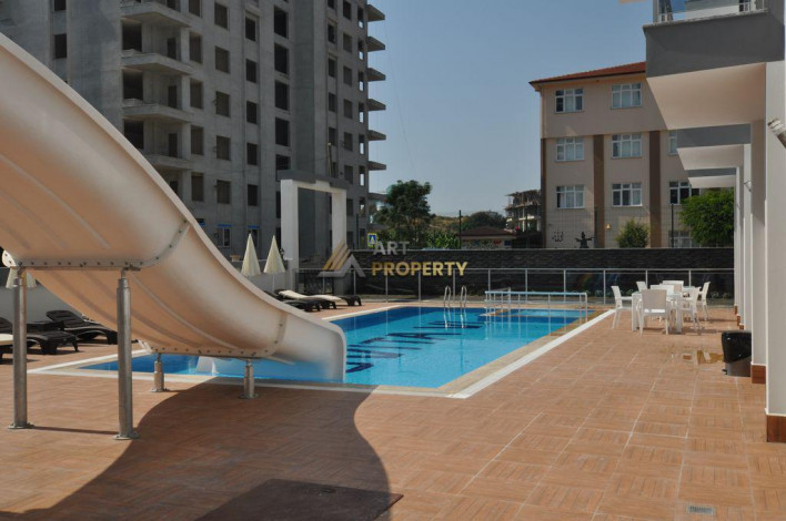 ID 1392  Квартира 1+1 в 500 метрах от моря, в районе Махмутлар,55 м2. - Ракурс 24