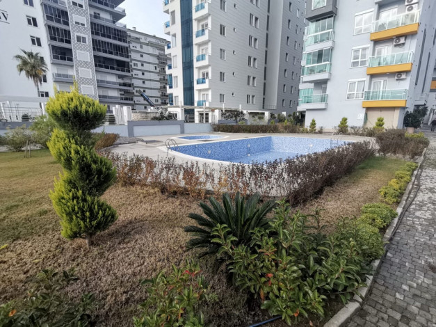 ID 1399 Квартира 1+1 с новой мебелью в Махмутларе,55 м2 - Ракурс 24