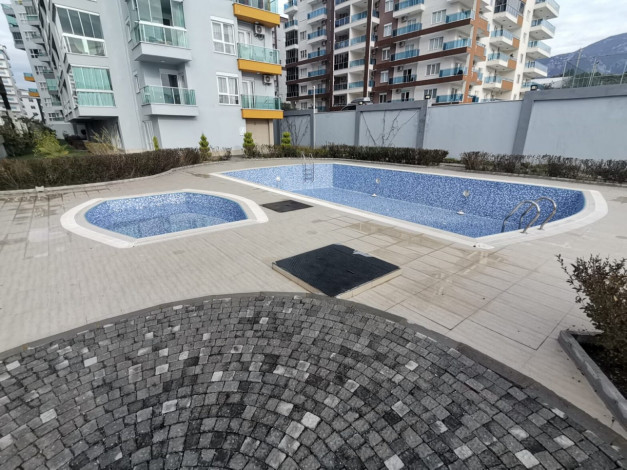 ID 1399 Квартира 1+1 с новой мебелью в Махмутларе,55 м2 - Ракурс 27