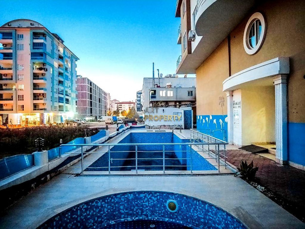 Квартира 1+1 в центре Махмутлар, 60 м2 - Ракурс 11