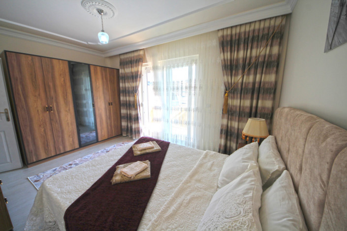 Трехкомнатная меблированная квартира в районе Махмутлар, 115м - Ракурс 19