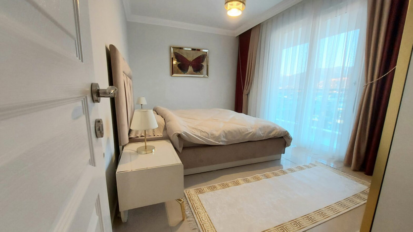 Полностью меблированные апартаменты на границе районов Кестель  и Махмутлар, 110м - Ракурс 6